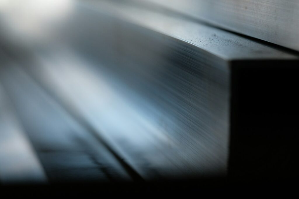 Abstract metallic surface with light reflections
